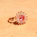 Petal Kiss Spinner Ring by Lupaire