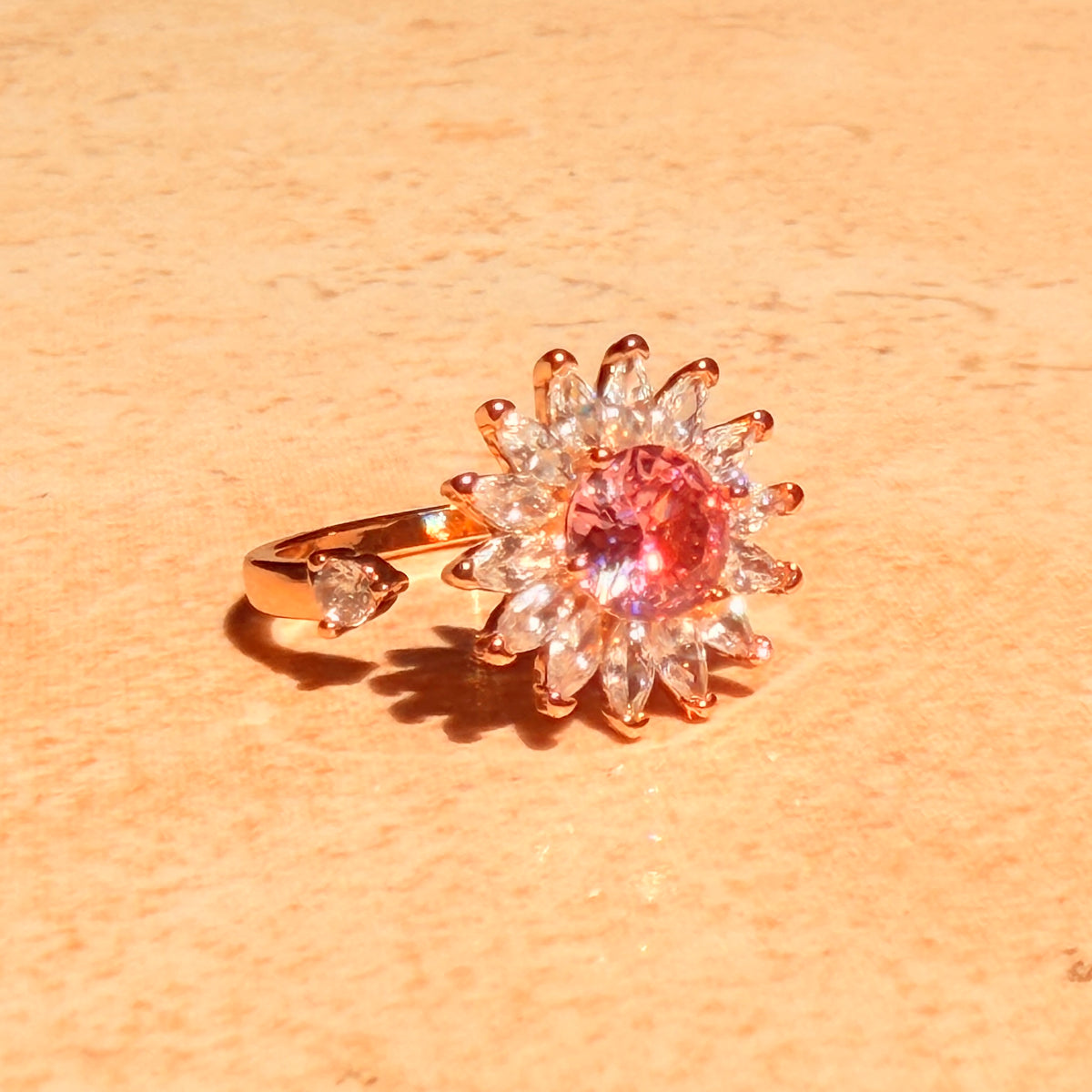 Petal Kiss Spinner Ring by Lupaire
