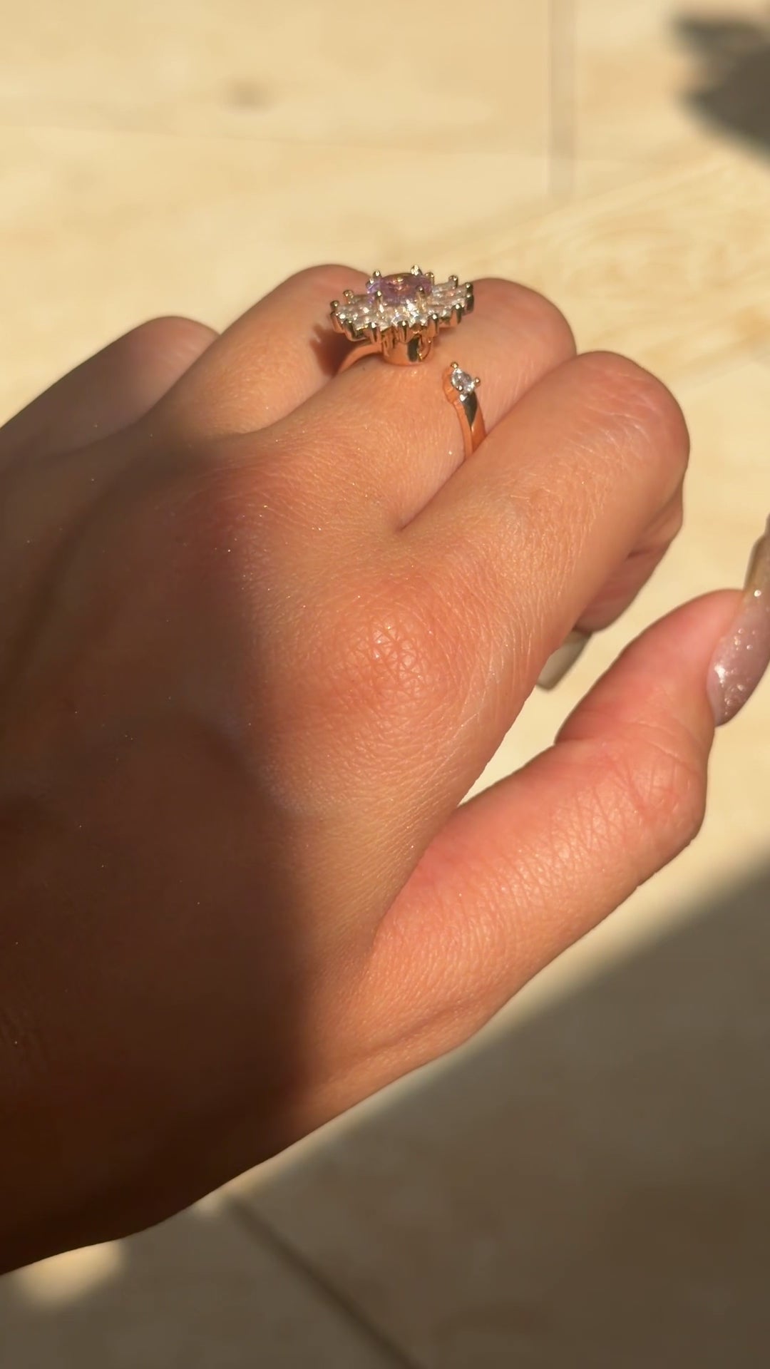 Petal Kiss Spinner Ring by Lupaire